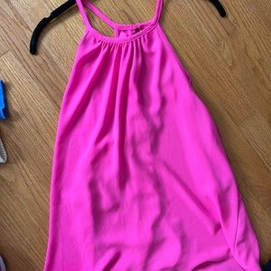 High neck pink top with ruffles on the back